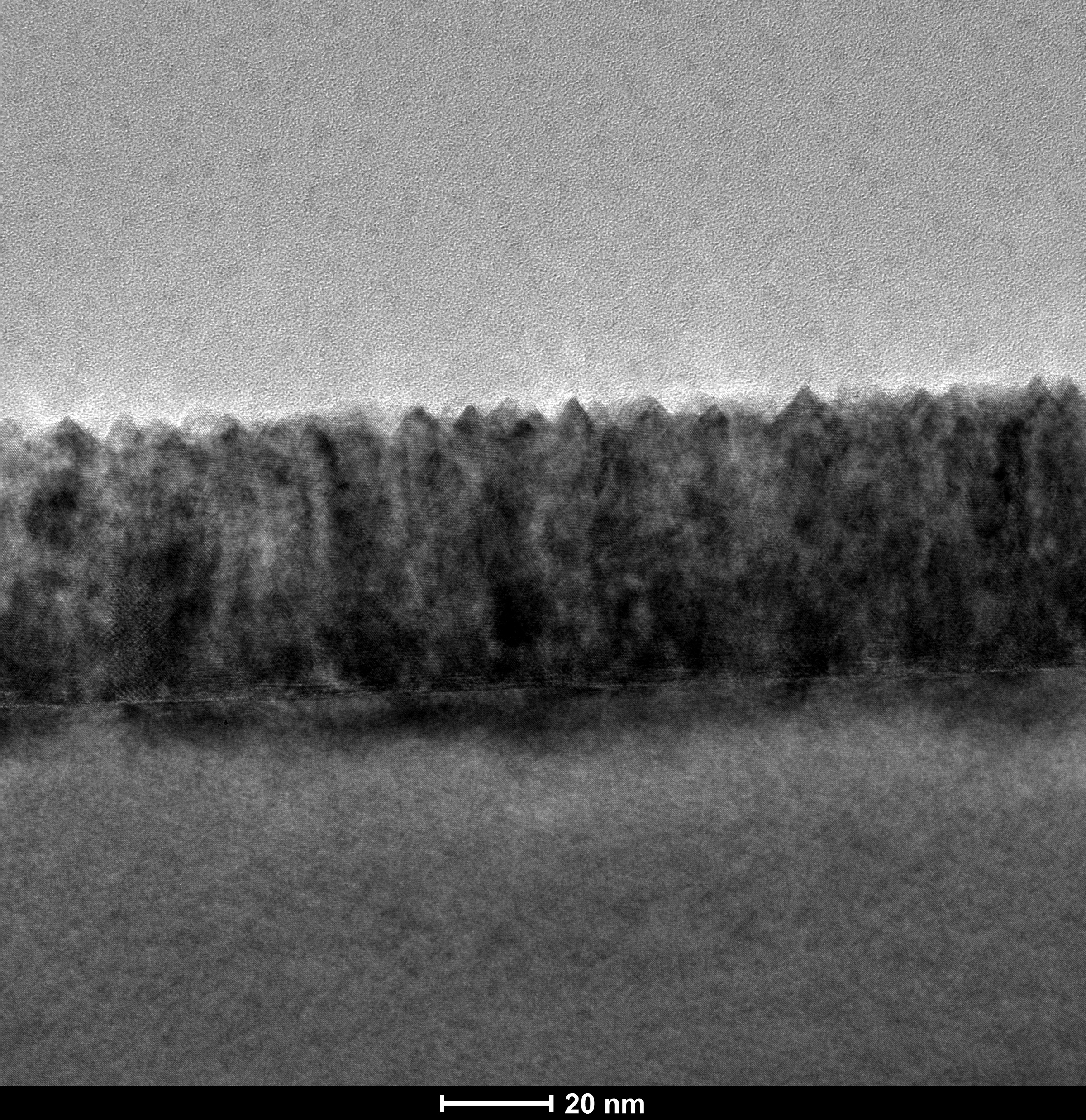 Cross-sectional microscopy of the VAN device material with a 20 nanometer scale bar